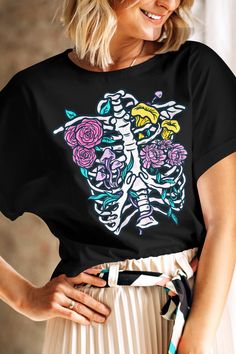 Pastel Goth Ribcage Flowers Botanical Top, Aesthetic Gothic Shirt, Soft Grunge Tshirt, Creepy Cute Clothing, Skeleton Ribs Anatomy, Floral Skeleton Shirt DETAILS ♥ This pastel goth floral ribcage design is printed on a premium soft Bella+Canvas 3001 t-shirt, unisex jersey short sleeve tee ♥ 100% Airlume combed and ringspun cotton (fiber content may vary for different colors): solid colors are 100% cotton except Ash (99% cotton, 1% polyester), heather colors are 52% cotton, 48% polyester (Athleti Skull Print Tops For Spring Streetwear, Trendy Spring Skull Print Top, Trendy Skull Print Top For Spring, Spring Black T-shirt With Skull Print, Black Skull Print T-shirt For Spring, Black Floral Print Tops For Streetwear, Spring Skull Print Crew Neck Top, Ribs Anatomy, Ribcage Design