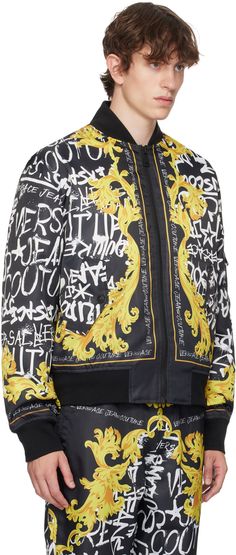 Insulated polyester twill bomber jacket. Logo graphic pattern printed throughout. · Rib knit stand collar, hem, and cuffs · Zip closure · Flap pockets · Utility pocket at sleeve · Patch pocket at interior · Full quilted taffeta lining Supplier color: Black/Gold Designer Winter Outerwear With Graphic Print, Designer Graphic Print Winter Outerwear, Designer Spring Outerwear With Graphic Print, Casual Winter Outerwear With Monogram Print, Casual Monogram Print Outerwear For Winter, All Over Print Outerwear For Spring Streetwear, Black Graffiti, Gold Bodies, Versace Jeans Couture