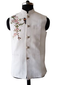 Hand painted Nehru jacket in pure linen fabric the motif is designed and painted by hand with very minute shading done.exclusive designer nehru jacket for your occassion to flaunt something new and very rare. jackets hand painted,rare designer nehru jackets We can also customize the colour we can do any personilization and make any design as you want White Embroidered Cotton Vest, Traditional White Nehru Jacket For Summer, White Cotton Nehru Jacket With Floral Embroidery, Traditional Cotton Nehru Jacket For Summer, White Cotton Nehru Jacket With Stand Collar, White Cotton Nehru Jacket For Spring, Sleeveless Embroidered Cotton Nehru Jacket, White Embroidered Sleeveless Nehru Jacket, White Sleeveless Cotton Nehru Jacket