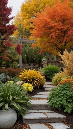 a garden with lots of colorful trees and plants in the center, along with stone walkways