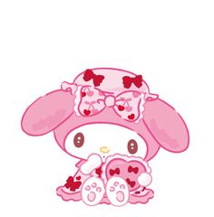 a cute little pink bunny with big ears and bows on her head sitting next to a stuffed animal