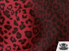 a red and black animal print fabric