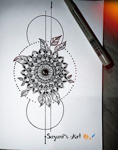 a drawing of a flower on paper next to a marker and pen with the words sayani's art written below it