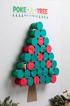 a christmas tree made out of toilet paper rolls