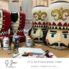 there are three nutcrackers painted on the table