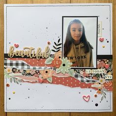 a scrapbook page with an image of a woman's face and flowers on it