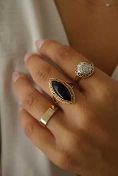 The ultimate statement ring for onyx lovers.Custom made to order. Please allow 1-2 weeks for delivery. Timeless Onyx Gemstone Rings, Elegant Black Rings With Gemstone Accents, Elegant Turquoise Cabochon Ring, Onyx Gemstone Open Ring Jewelry, Elegant Gold Turquoise Open Ring, Elegant Turquoise Ring, Modern Onyx Open Ring, Black Cabochon Ring In 14k Gold, Black Rings With Gemstone Accents