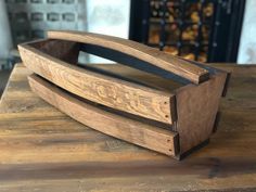 a wooden box sitting on top of a table