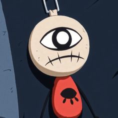 a key chain with an evil looking cartoon character hanging from it's back end