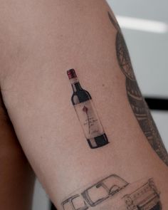 Tattoo Designs, tattoo aesthetic, Tattoo for women, Tattoo ideas, tattoo for men Wine Bottle Tattoo, Women Tattoo Ideas, Infinity Tattoo With Feather, Feminine Skull Tattoos, Realistic Tattoo Sleeve, Bottle Tattoo, Tattoo Aesthetic, Tattoo Aftercare, Aesthetic Tattoo