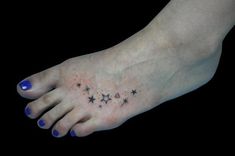 a woman's foot with stars on it