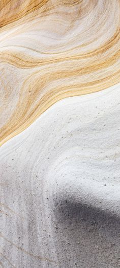 an abstract photograph of sand and water