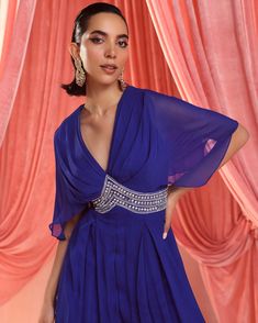 Elevate your style with this pleated draped jumpsuit, featuring an eye-catching embellished waistline. Effortlessly chic and sophisticated, this ensemble is perfect for making a statement at any occasion. Draped Jumpsuit, Blue Drapes, Pleated Drapes, Custom Tailoring, Elevate Your Style, Asian Fashion, Electric Blue, Your Style, Custom Sizing