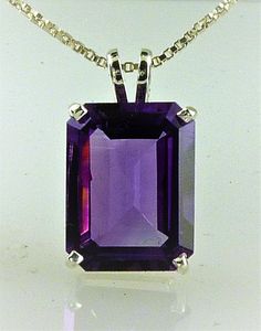 All our jewelry is handcrafted in the USA What a gorgeous Amethyst pendant this is! With rich purple color. This beautiful stone is an Emerald cut Amethyst, not too large and not too small 9.24 carats that is sure to turn heads. Set in a simple classic setting of solid .925 sterling silver. What February baby do you know that needs one of these? She'll be so impressed... Amethyst is the birthstone for February. Amethyst, (1) Emerald Cut 16x12 mm, 9.24 carats. If you need this item for a special Luxury Emerald-cut Amethyst Jewelry, Luxury Purple Emerald Cut Jewelry, Luxury Purple Emerald-cut Jewelry, Luxury Emerald Cut Amethyst Jewelry, February Baby, Rich Purple, Pink Amethyst, Amethyst Necklace, Amethyst Pendant