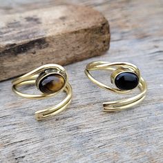 Adjustable Gemstone Rings, Boho Brass Rings, Ethnic Style Rings, Stacking Gold Tone Ring, Tiger Eye Ring, Large Rings, Perfect Gift For Her You will get both rings with your purchase (Tiger Eye And Black Onyx) Buy One Get One Free Ring Sized - Adjustable High quality brass Visit Our Store https://yesindiatreasures.etsy.com Regards Large Rings, Tiger Eye Ring, Rings Stacking, Rings Boho, Brass Rings, Large Ring, Eye Ring, Brass Ring, Ethnic Style