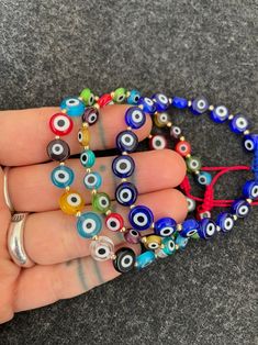 Evil Eye Bracelet Kabbalah Bracelet Wish Bracelet Jewish | Etsy Adjustable Evil Eye Bracelet With 8mm Beads, Multicolor Evil Eye Friendship Bracelets For Festivals, Spiritual Evil Eye Bracelet With 8mm Beads, Evil Eye Bracelet With Spacer Beads As Gift, Bohemian Friendship Bracelets With Evil Eye, Evil Eye Bracelet With Round Spacer Beads For Gift, Evil Eye Bead Bracelet Gift, Multicolor Evil Eye Friendship Bracelets With Round Beads, Multicolor Evil Eye Bracelet With Colorful Round Beads