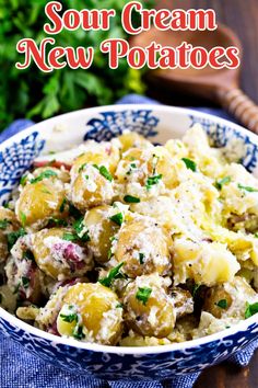 a blue and white bowl filled with potato salad