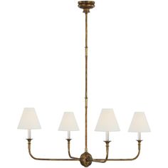 an antique brass chandelier with five lamps on each arm and white shades hanging from the ceiling