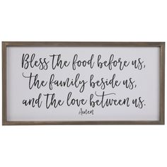 a framed sign that says,'be the food before us, the family beside us, and the love between us '