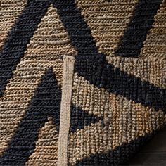 a close up view of a rug on the floor