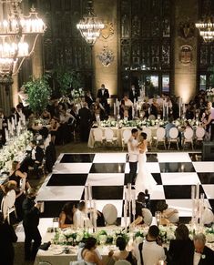 an overhead view of a wedding reception in the great hall