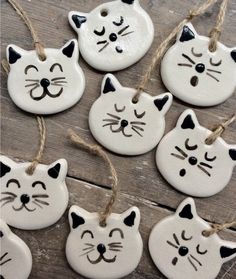 white ceramic ornaments with black cats on them