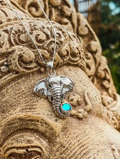 Elephants are strong, gentle creatures that represent wisdom, protection, and mental strength. The 925 sterling silver Elephant Pendant is a beautiful way to remind yourself of your power and resiliency. Sterling Silver Components: Sterling silver .7mm box chain, 18" included with pendant. Dimensions: 1.090"H (including bale) x 0.917"W Stone Stone Diameter: 5mm Sterling Silver Snake Chain upgrades are available HERE. Spiritual Sterling Silver Box Chain Jewelry, Sterling Silver Box Chain Spiritual Necklace, Sterling Silver Box Chain Necklace In Spiritual Style, Holistic Sterling Silver Necklace With Gemstones, Silver Elephants, Elephant Pendant, Silver Snake Chain, Snake Chain, Cable Chain