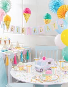 a birthday party with ice cream cones and decorations