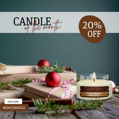 candles and presents are sitting on a table with the words candle of the month 20 % off