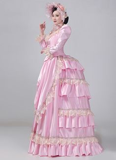 Women 19th Century Pink Lace Victorian Bustle Dress Color: Pink   Material: This dress made of High Quality Satin, soft,smooth and comfortable to wear  Sleeve Length:  Long Sleeve  Dresses Length:Floor Length  Neckline:  Square Collar  Decoration: Ruffles + Lace  Package Includes:  Dress + Hat   The length of skirt about 45 inches (114 cm) long from waist to hem regardless of size. This dress is pictured with a 6-hoop skirt Petticoat underneath to achieve the look. Petticoat are NOT INCLUDE Edwardian Masquerade, Victorian Bustle Dress, 1880s Dress, Dress Holder, Masquerade Party Dresses, Bustle Dresses, Gothic Victorian Dresses, Victorian Bustle, Bustle Dress