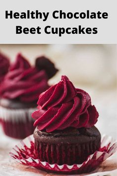 two chocolate cupcakes with red frosting on top and the title reads healthy chocolate beet cupcakes