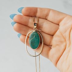 Rich bright yellow gold perfectly balances with the deep blue green of the turquoise. Bezel set, this negative space design is a one of a kind. Modern Oval Turquoise Jewelry, Modern Turquoise Oval Jewelry, Turquoise Chrysocolla Oval Pendant Necklace, Estate Wedding Ring, Negative Space Design, Turquoise Pendant Necklace, Estate Rings, Gem Diamonds, Negative Space