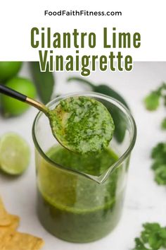 cilantro lime vinaigrete in a small glass with a spoon full of it