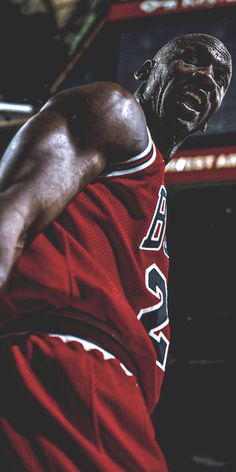 a close up of a basketball player wearing a jersey