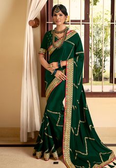 Green silk festival wear saree 2605  Desc:  Color : Green Fabric : Silk Work : Embroidery Wash Care : Dry clean Sleeve Style : Half Sleeve Long Sleeves : Done only in Custom Stitch Sleeves Lining : Done only in Custom Stitch Bust Size : 32 to 42 Inches Occasion : Festival   Christmas   Diwali   Engagement   Ceremonial   Pongal   Lohri   Gudi Padwa   Onam. With Express Free Shipping and Custom Stitching, Buy Indian Wedding Party Wear Saree Green silk festival wear saree 2605 online in USA, UK and Crepe Silk Sarees, Wedding Party Wear, Indian Silk Sarees, Wedding Saree Indian, Silk Saree Blouse, Green Saree, Trendy Sarees, Art Silk Sarees, Designer Dresses Indian