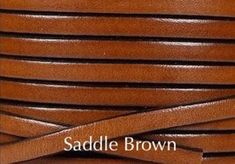 a close up of a leather cord with the words saddle brown on it and an image of