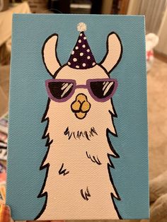 a painting of a llama wearing sunglasses and a party hat