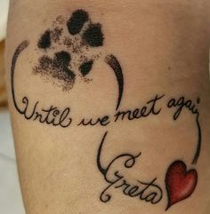 a dog paw and heart tattoo with the words, until we meet again