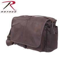 Rothco's Brown Leather Classic Messenger Bag is made with a premium rugged leather material that is both durable and stylish and is perfect to take anywhere. The bag features one large main compartment with an interior pocket, 2 front open top pockets, 2 side pockets with snap closure, front flap with snap closure, 2" wide adjustable leather shoulder strap and the bag features antique brass hardware to complete the vintage look. Military Messenger Bag, Black Sling Bag, Brown Leather Messenger Bag, Bag With Pockets, Rugged Leather, Men's Totes, Messenger Bag Men, Leather Messenger Bag, Mini Crossbody Bag