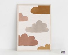 a card with some clouds on it