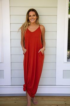 The perfect maxi dress! The Cami is made with comfort and style in mind. It’s a loose fitting v neck with adjustable straps and pockets. We love doing a bottom tie knot, adding a belt or even pairing with a denim jacket! It’s so versatile and with so many colors to choose from, the sky’s the limit with this beauty. Adjustable Straps Side Pockets Loose Fitting Colors: Copper. Also Pictured in Ash Mustard Body Length 49”, Chest, 34” Approx. Measured From Small 57% Polyester, 38% Rayon, 5% Spandex Maxi Dress Tied At Bottom Knots, Maxi Dress Tied In Knot, Tie Maxi Dress Knot, Dress Tied In Knot, Maxi Dress Knot, Dress Knot, Maxi Skirt Dress, Knot Dress, Black Camis