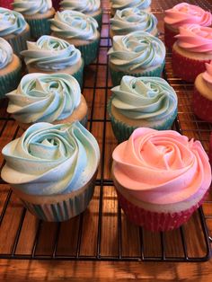 there are many cupcakes on the cooling rack