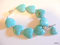 Bracelete detailes:  Lenth of bracelet is 18 cm.Heart shape turquoise beads are 18x20 mm. Tiny key charm and smaller size turquoise heart looks lovely. The easy wear silver plated special clasp has also Heart shape. Cheap Turquoise Heart Beads, Turquoise Bracelets With Heart Beads For Jewelry Making, Turquoise Heart Beads Bracelet, Turquoise Bracelet With Heart Charm For Gifts, Turquoise Bracelet With Heart Charm As Gift, Turquoise Bracelets With Heart Charm As Gift, Handmade Turquoise Heart Bracelet, Turquoise Heart Beads Bracelet As Gift, Turquoise Heart Beads Bracelet Gift