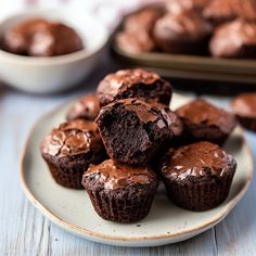 chocolate cupcakes with frosting on a plate