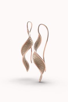 Gold earrings available in 18k or 14k real solid gold* Long Gold Earrings Made in Italy* Twisted gold earrings designed and crafted in Italy Stunning earrings made from a continuous solid gold ribbon that elegantly hangs from a long ear wire. Long twisted earrings crafted in polished and raw gold 18k or 14k. Ear wire earrings made in Italy. Modern and symmetric long earrings in genuine solid gold. Customizable Materials 14k solid yellow gold, white gold, rose gold (processing times for 14k rose Rose Gold Earrings With Shiny Finish As Gift, Elegant Rose Gold Linear Earrings In 14k Gold, Rose Gold Earrings With Shiny Finish For Gift, Rose Gold Polished 14k Gold Earrings, Rose Gold 14k Gold Earrings With Polished Finish, Elegant 14k Rose Gold Linear Earrings, Rose Gold 14k Polished Earrings, Elegant 14k Gold Earrings With Shiny Finish, Rose Gold Polished Finish Earrings As Gift