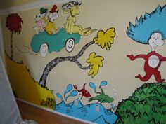 the dr seuss mural is painted on the wall in this child's room