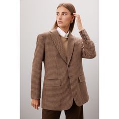 Brown plaid knit (43% Cotton, 40% Wool, 14% Polyamide, 3% Other Fiber). Lining (Body lining: 100% Viscose. Sleeve lining: 52% Viscose, 48% aAetate). Blazer. Long sleeves. Collar.  Front button closure. 29.5" from shoulder to hemline. Imported. Classic Tweed Jacket With Houndstooth Pattern For Spring, Classic Houndstooth Tweed Jacket For Spring, Timeless Plaid Outerwear For Work, Classic Plaid Blazer For Winter, Fitted Beige Houndstooth Outerwear, Ralph Lauren Fitted Wool Blazer, Timeless Plaid Wool Outerwear, Elegant Brown Houndstooth Outerwear, Classic Ralph Lauren Single-breasted Blazer