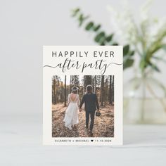 the happily ever after party photo card is displayed on a table next to a vase with flowers