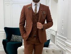 "This is a Classic 3 Piece Suit by Golden Attire crafted from high quality fabric and imported materials. Our products are handcrafted by experienced tailors who make sure the that the stitching is precise, lining is proper and the overall product is sturdy enough to not go out of shape for more than a few years. Also all our products have extra margins in their length, sleeves, sides so it's easily alterable if your size changes after some time. To see more available colours and designs in this collection, Check out the 'Classic Two Piece Suits' Section. *This is a 3 piece set of a jacket and a trouser. *We also offer customization so we can provide you an even better fit if you massage us your measurements (in inches) of Chest, Stomach, Waist, Hip, Shoulder and Actual Height after orderi Brown Three-piece Wedding Suit, Fitted Brown Wedding Sets, Fitted Wedding Sets With Buttons, Terracotta Suit, Beige Suits For Men, Engagement Suits, Reception Suits, Wedding Suit Groom, Rosé Suit