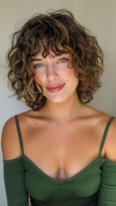 Curly haircuts are all about celebrating your texture and finding a style that complements your face shape. Whether you have loose waves, bouncy spirals, or tight coils, there’s a curly haircut out there that will Curly Bun Hairstyles Short Hair, Oval Face Curly Haircuts, Curly Hair Oval Face, Wavy Haircut Ideas, Curly Bob With Bangs, Hairstyles For Oval Faces, Natural Curly Hairstyles, Girl Hair Styles, Curly Cut